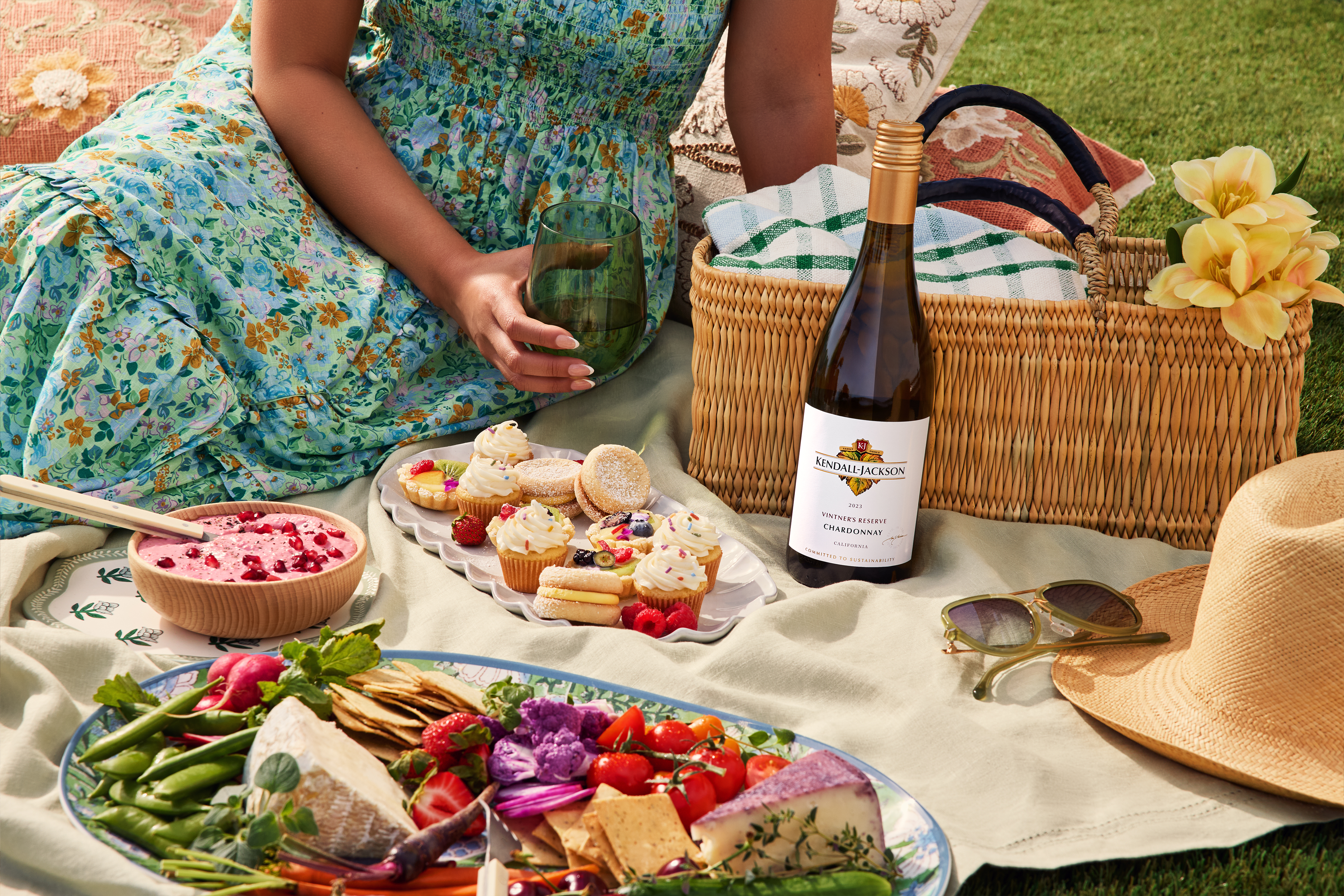 Kendall-Jackson Vintner's Reserve Chardonnay during spring enjoying a picnic outside because they are having so much fun and love drinking our wine.